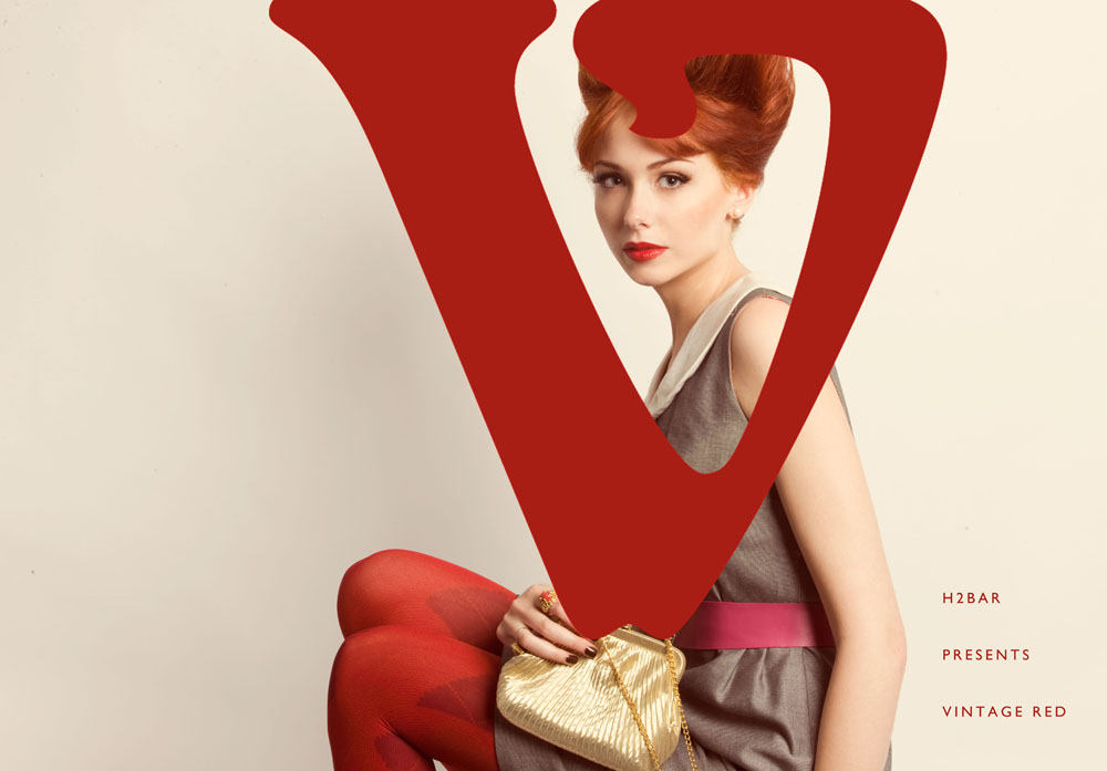 Vintage 1960s Mad Men inspired redhead fashion editorial red lips beehive